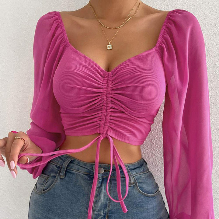 Damebluse med rynket design og ballonformede ærmer Stilla