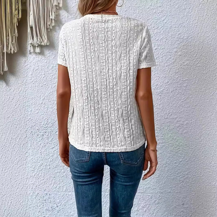 Dame moderigtig top med struktureret design og kort ærme Stilla