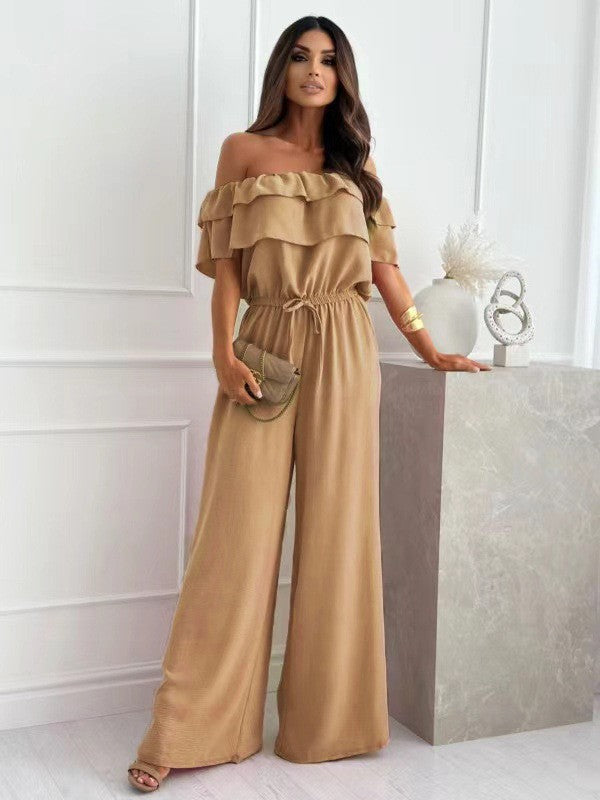 Dame jumpsuit med skulderfri design og bredt ben Stilla