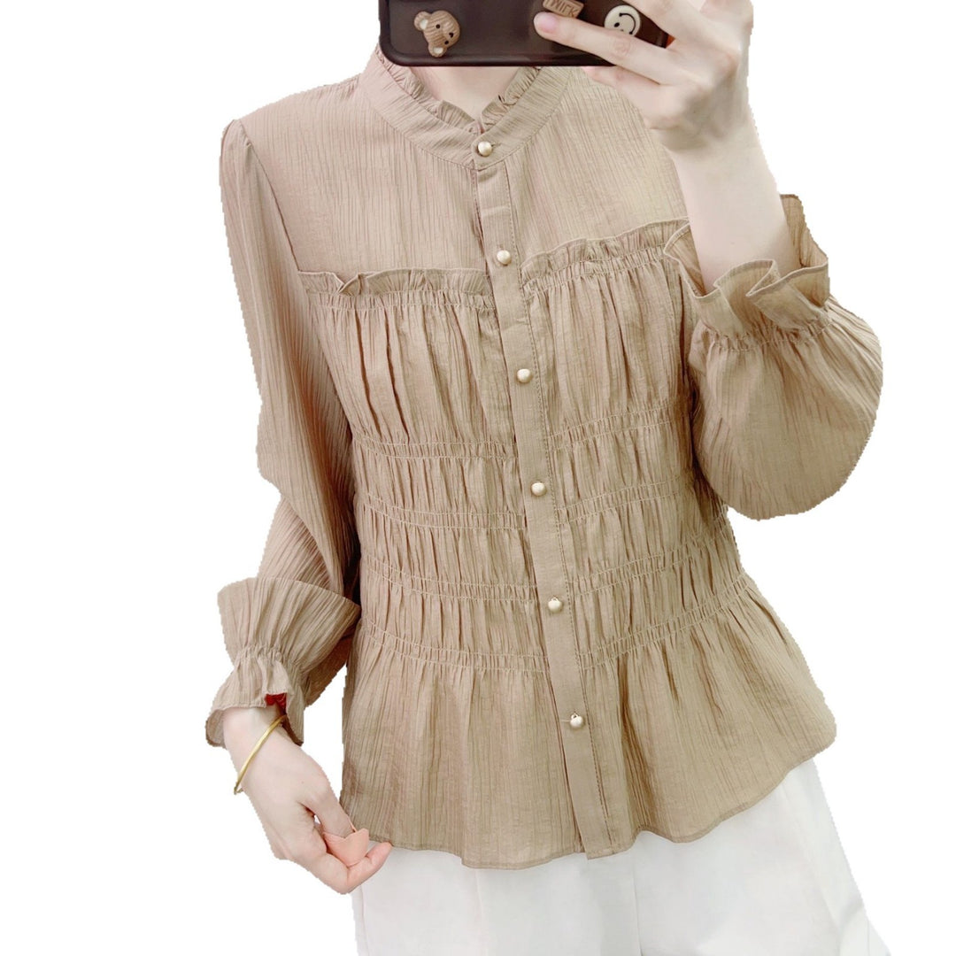 Dame elegant bluse med rynkedesign og knapdetaljer Stilla