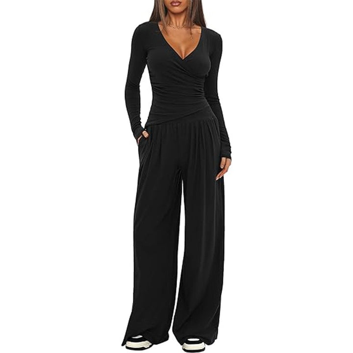 Dame afslappet jumpsuit med omslagsdesign og bredt ben Skovae