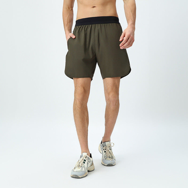 Herre åndbare sportshorts med elastisk linning og hurtigttørrende materiale Stilla
