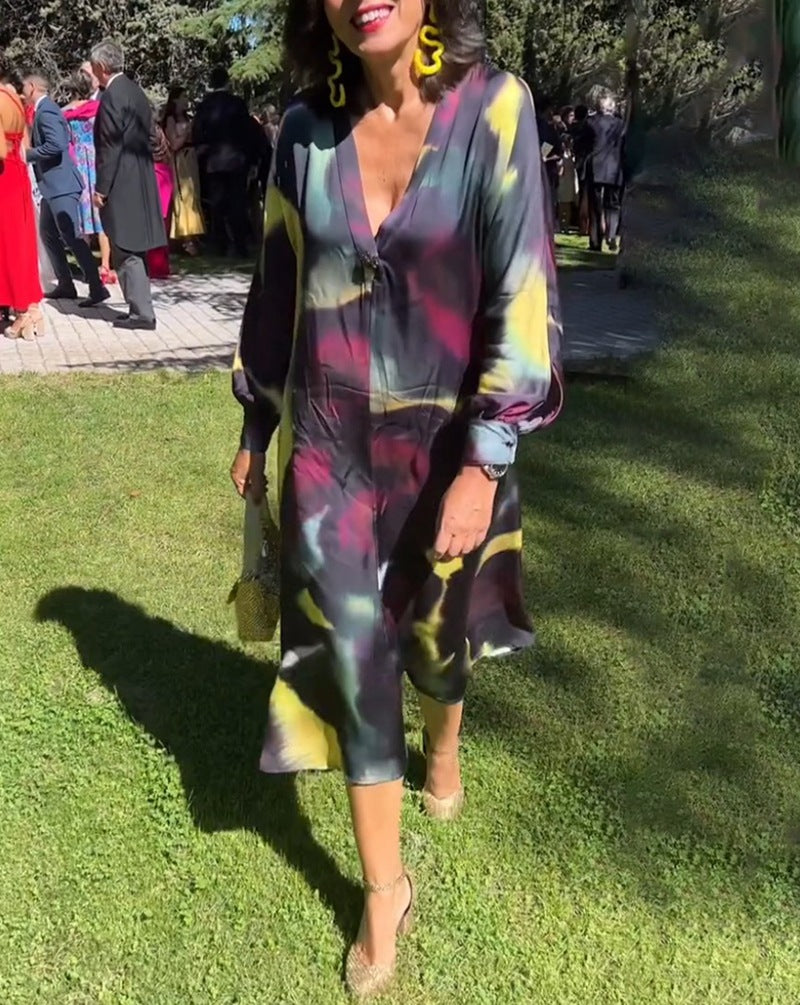 Dame Maxikjole med farverigt batikdesign og elegante pufærmer Stilla