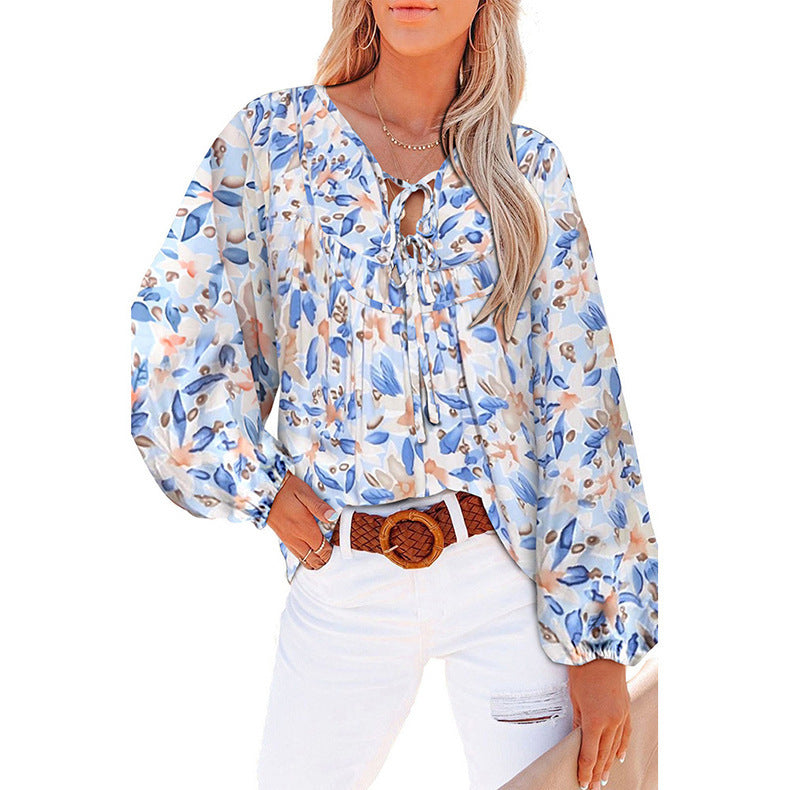 Damebluse med blomsterdesign og voluminøse ærmer Stilla
