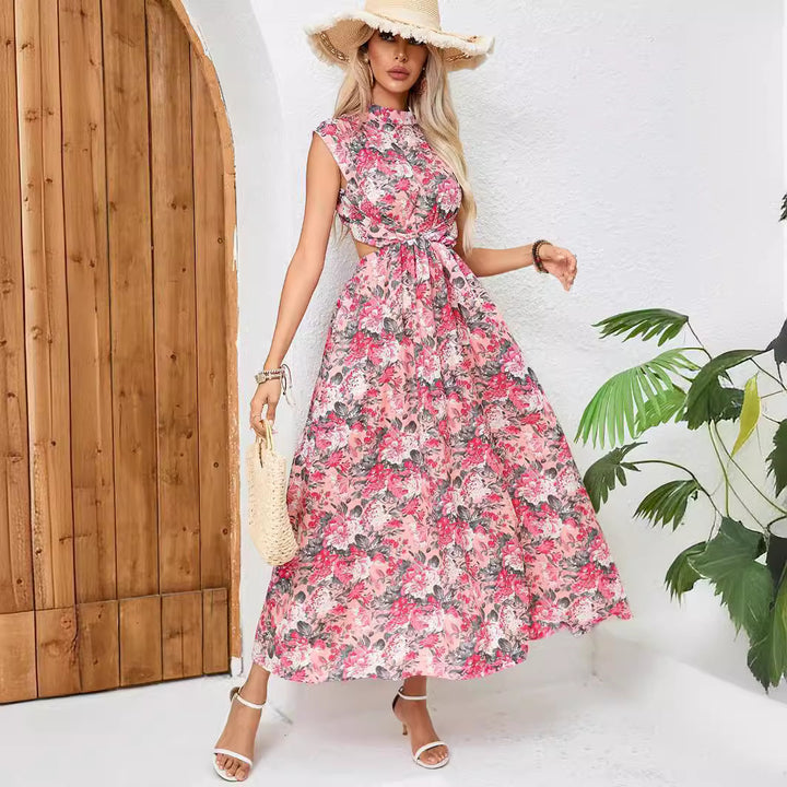 Dame maxikjole med floralt omslagsdesign og asymmetrisk kant Stilla