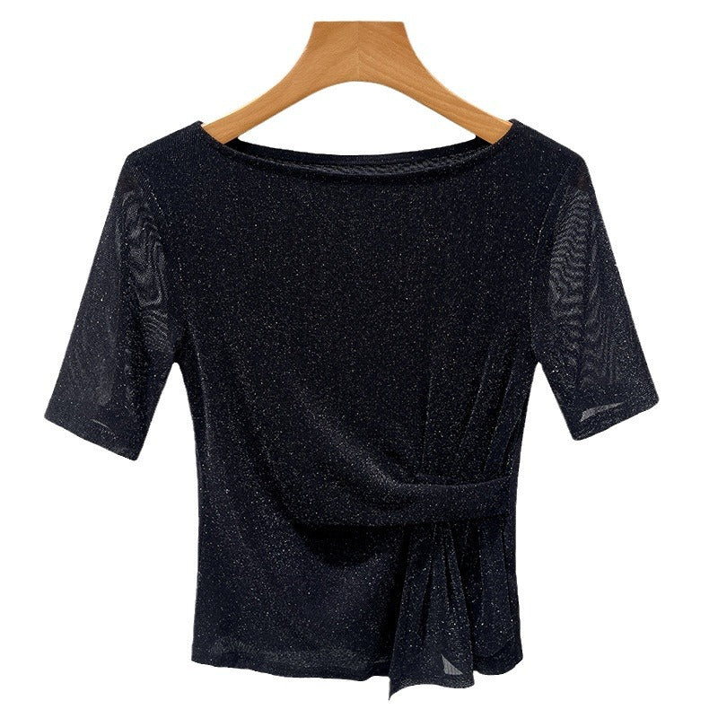 Dame Elegant top med glitrende stof og stilfuld indpakningsdesign Stilla