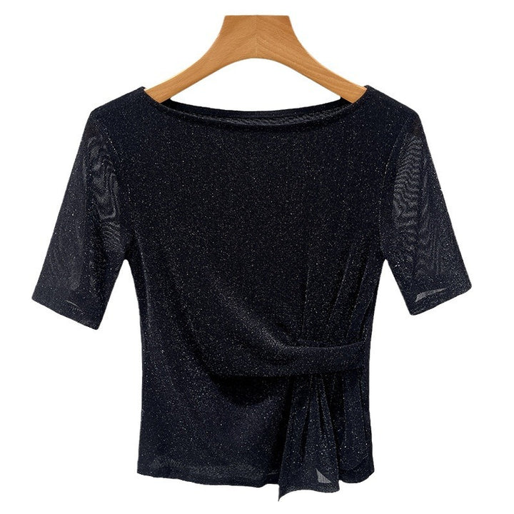 Dame Elegant top med glitrende stof og stilfuld indpakningsdesign Stilla