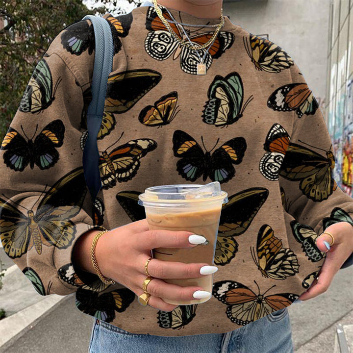 Dame sweatshirt med kreativ sommerfuglemotiv og afslappet snit Stilla