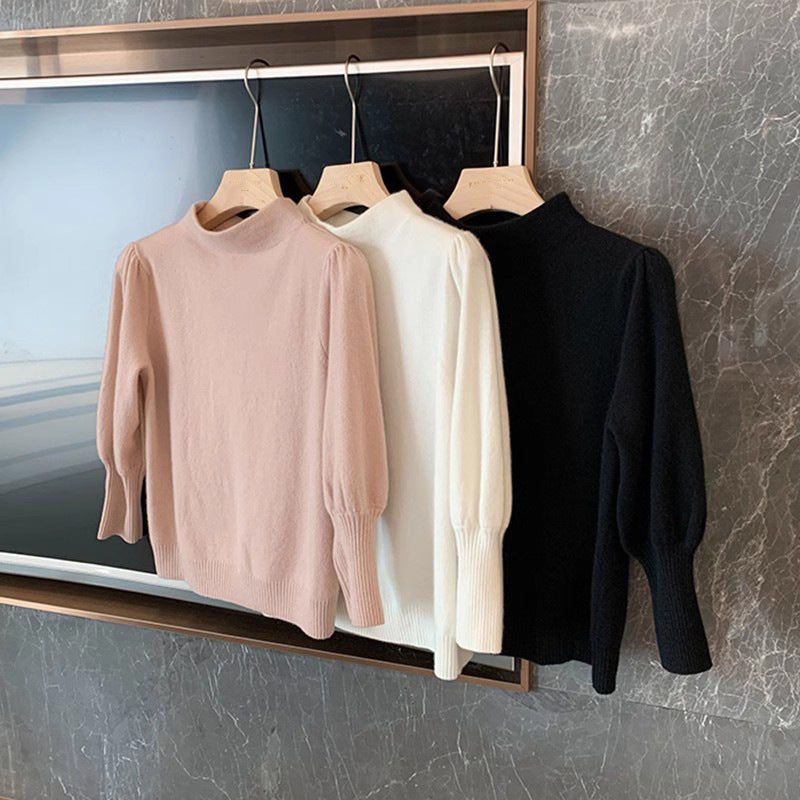 Dame elegant rullekrave sweater med voluminøse ærmer og ribdetaljer Stilla