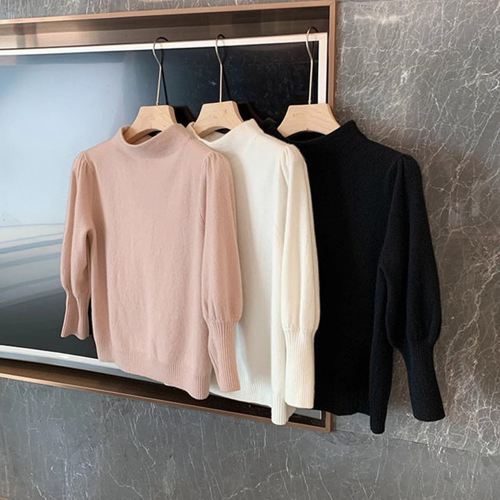 Dame elegant rullekrave sweater med voluminøse ærmer og ribdetaljer Stilla