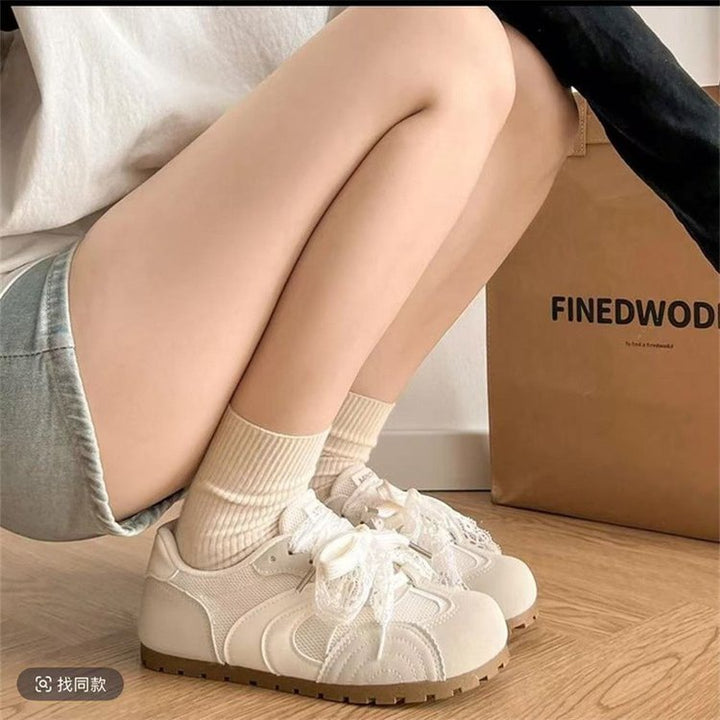 Dame Sneakers med innovativt rufflesdesign og åndbart mesh-overflade Stilla