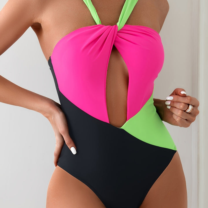 Dame Én-delt Badedragt med iøjnefaldende Twist-design og dyb V-udskæring Stilla