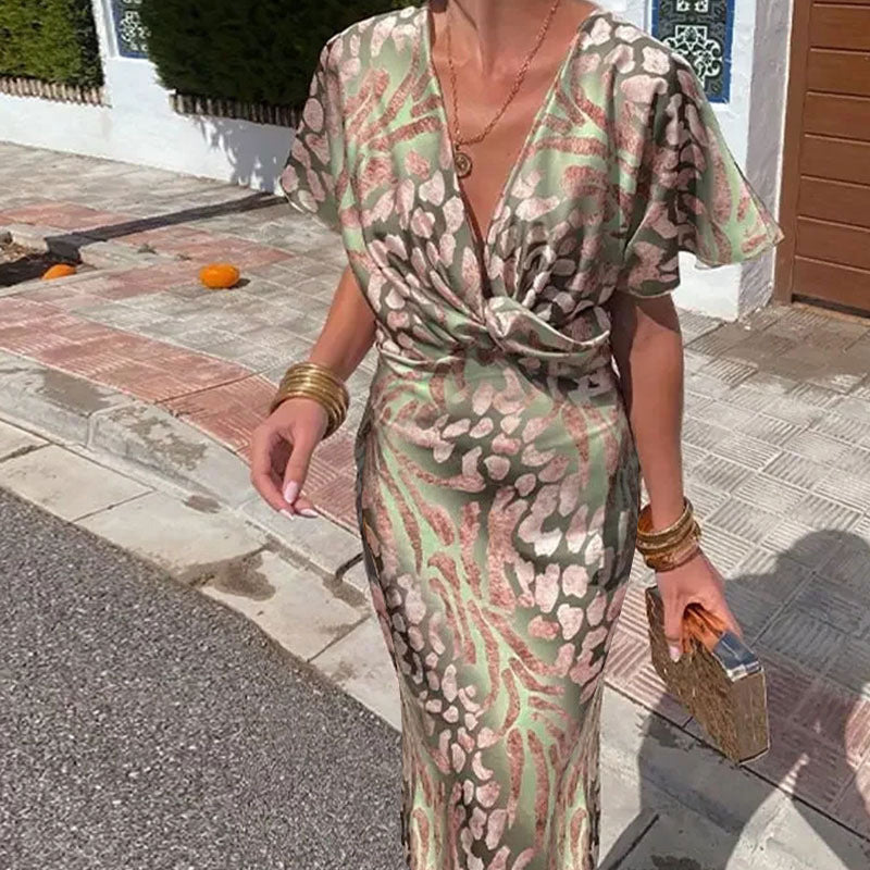 Dame Maxikjole med elegant V-hals og unikt mønster Stilla