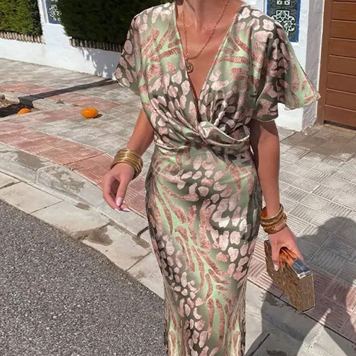 Dame Maxikjole med elegant V-hals og unikt mønster Stilla