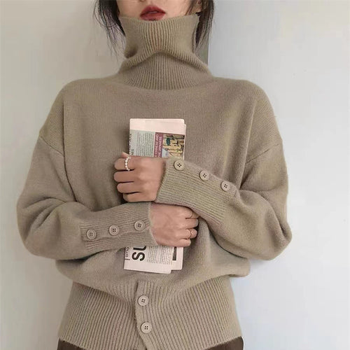 Kvinders rullekrave sweater med knapdetaljer og blødt materiale Stilla
