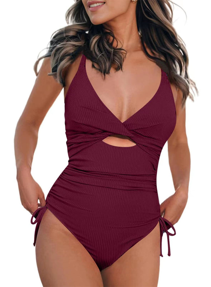 Dame one-piece swimsuit with subtle cut-outs and adjustable straps Skovae