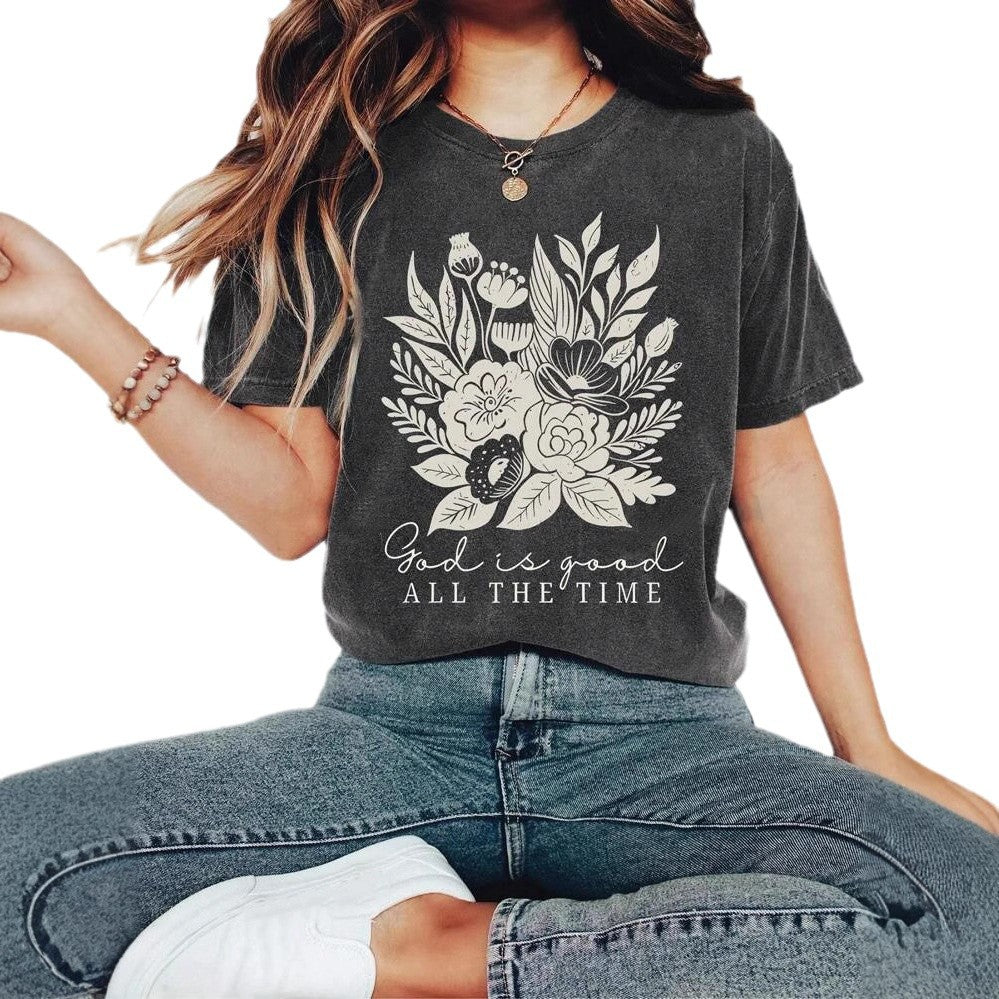 Dame T-shirt med floralt motiv og inspirerende tekst Stilla