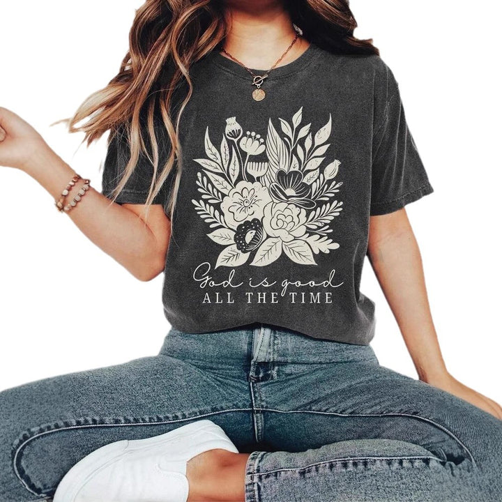 Dame T-shirt med floralt motiv og inspirerende tekst Stilla