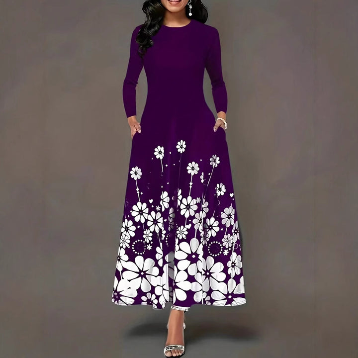 Dame maxikjole med blomstret design og praktiske lommer Stilla