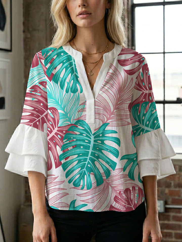 Dame bluse med voluminøse ærmer og kreativt trykdesign Skovae