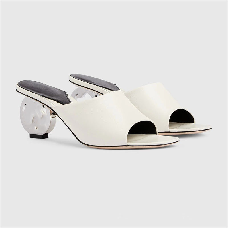 Femme Open-Toe Mules med skulpturel hældesign Stilla