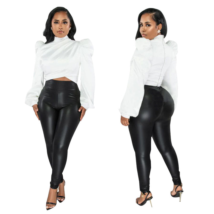Dame mode Cropped top med puffærmer og høj krave Stilla