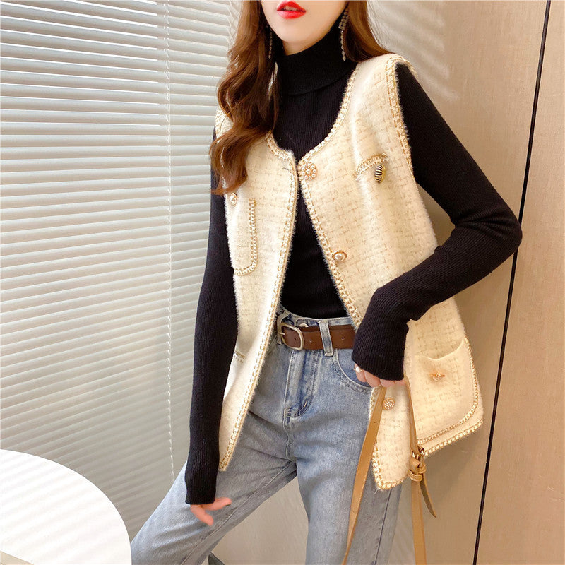 Kvindernes elegante cardigan med dekorative knapper og stilfuldt design Stilla