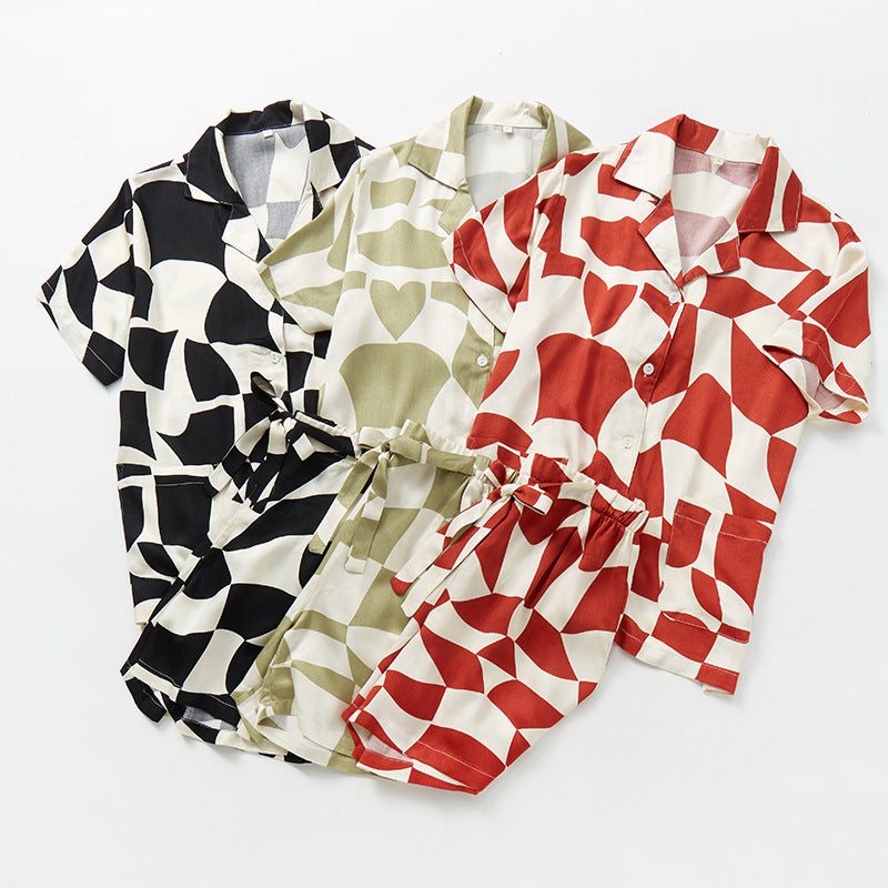 Dame Pyjamasæt med legende geometrisk design og praktiske lommer Stilla