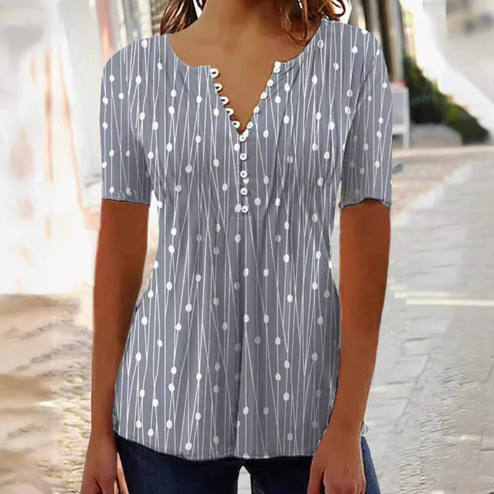 Dame bluse skjorte med moderigtigt prikkedesign og elegant knapliste Stilla