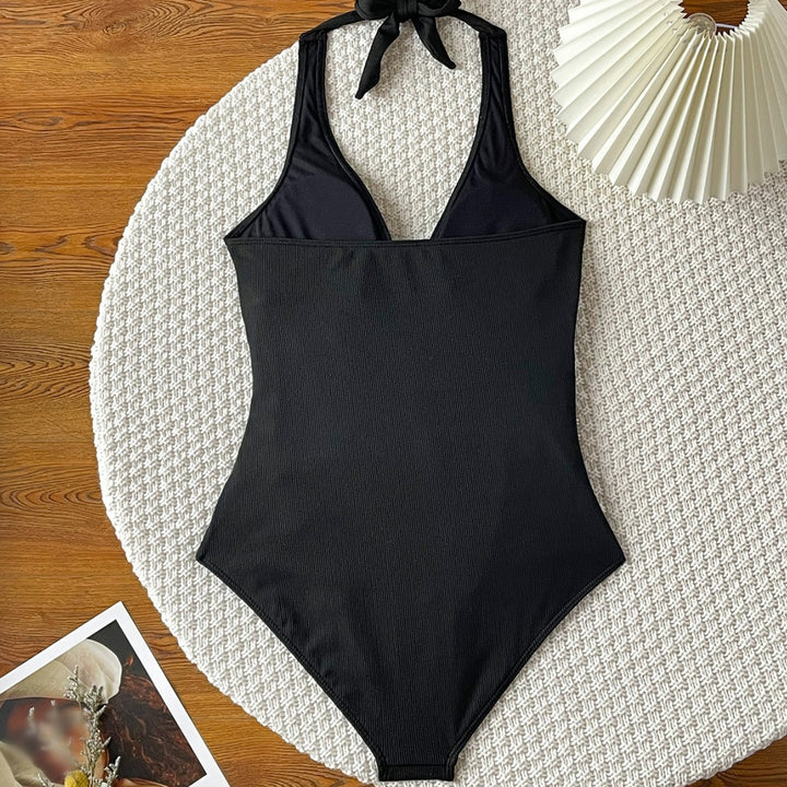 Dame Wrap-badedragt med elegant V-hals og figurskabende effekt Stilla