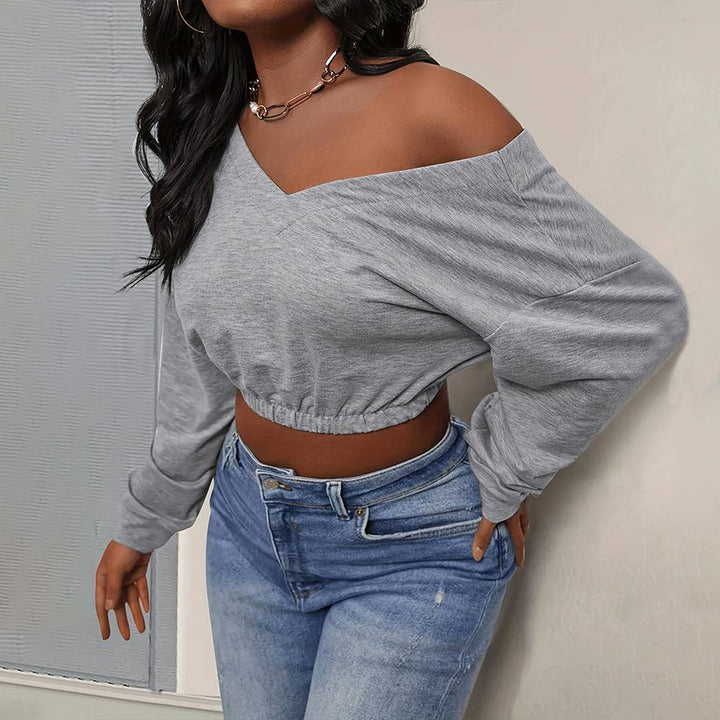 Kvindernes afslappede crop top med off-shoulder design og tætsiddende kant Stilla