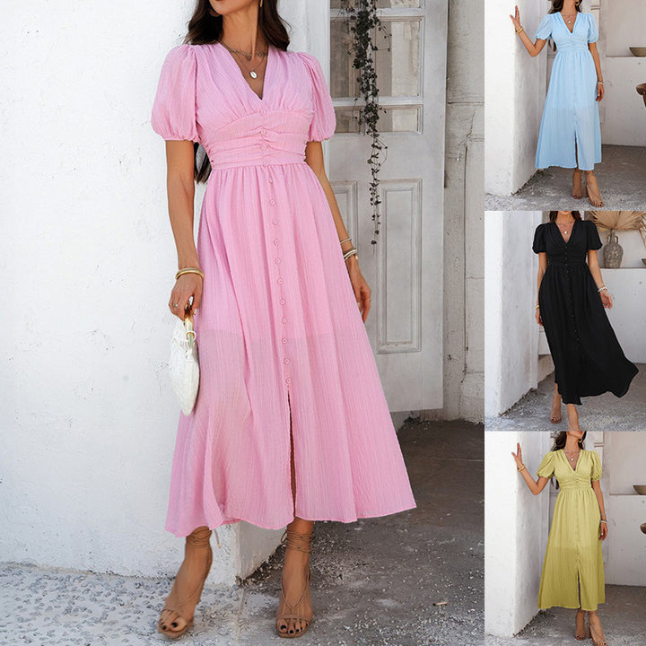 Dame maxikjole med elegant knaplukning og pufærmer Stilla
