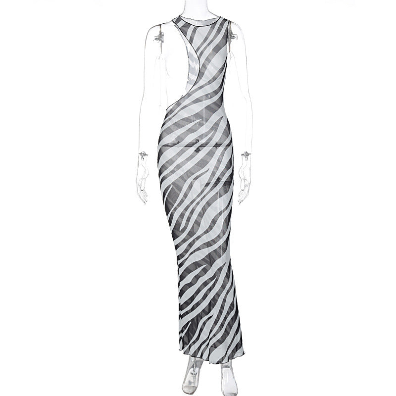 Dame Maxikjole med raffineret zebrastribe-mønster og moderne cut-out-design Stilla