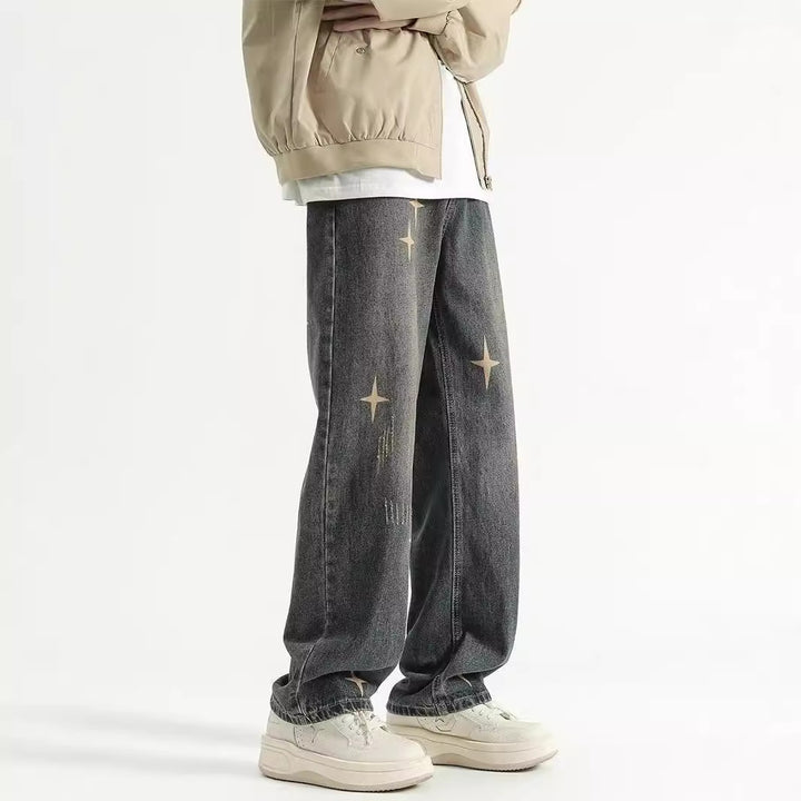 Herren brede jeans med moden distressed-effekt og kreative applikationer Stilla