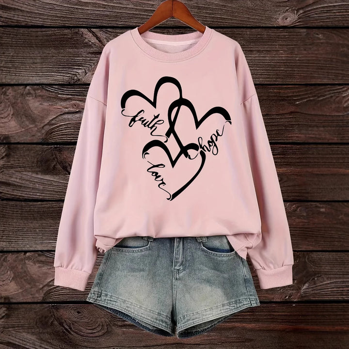 Kvindernes sweatshirt med romantisk hjertemotiv og inspirerende print Stilla