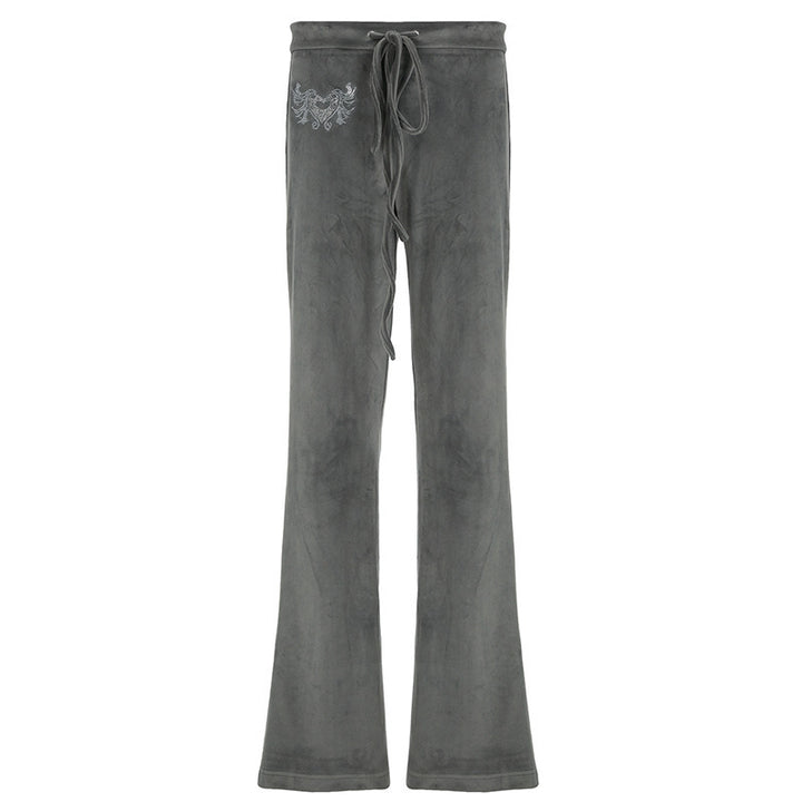 Dame-sweatpants i afslappet flared-design med trendy broderier Skovae