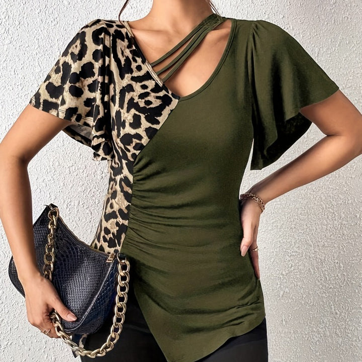 Dame Trendy top med asymmetrisk design og raffinerede cut-outs Skovae