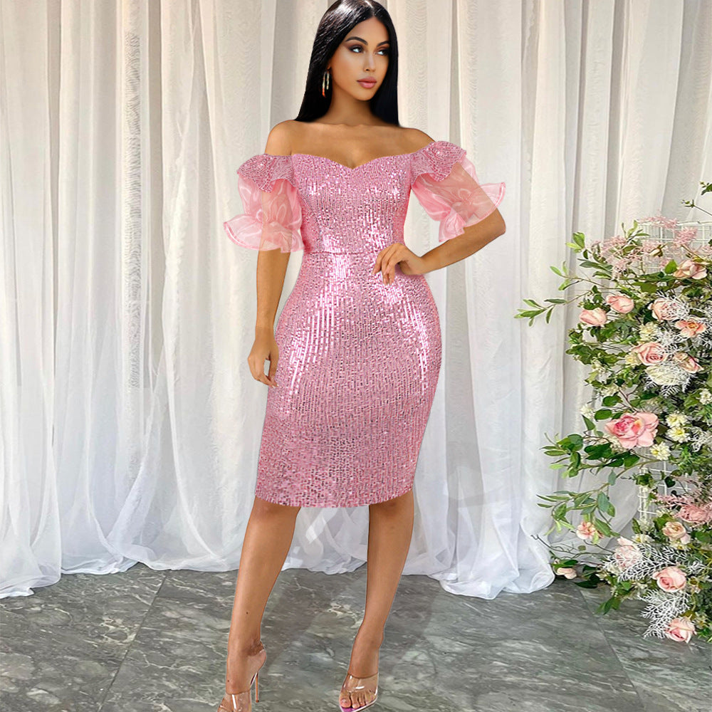 Dame glamourøst aftenkjole med glimmer og transparente puffærmer Skovae