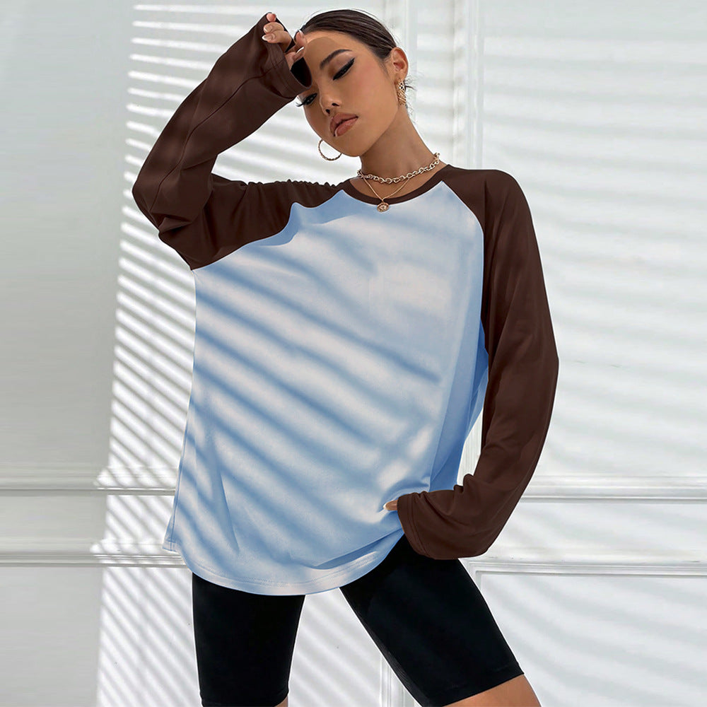 Kvinders langærmet T-shirt med sporty raglan-snit og trendy farveblokdesign Stilla