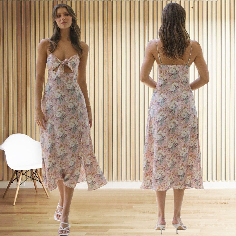 Dame floral Midikjole med rygfri silhuet og elegante spaghetti-stropper Stilla