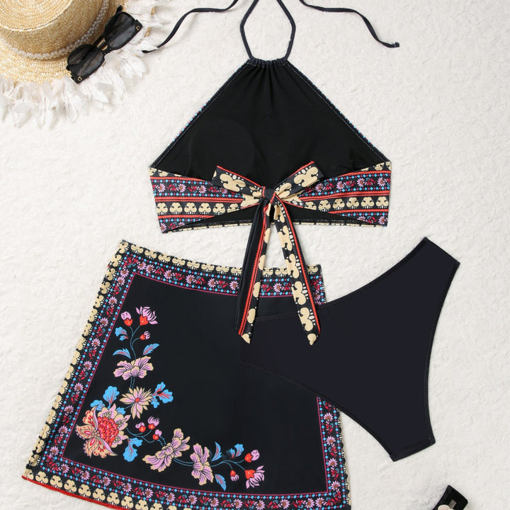 Dame asymmetrisk crop top og wrap nederdel sæt med florale accenter Stilla