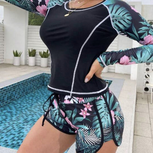 Dame langærmet sport-badesæt med blomsterinder og shorts Stilla