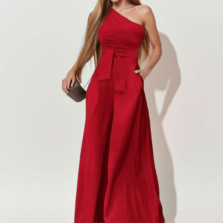 Kvindernes elegante one-shoulder jumpsuit med taljebælte og brede ben Stilla