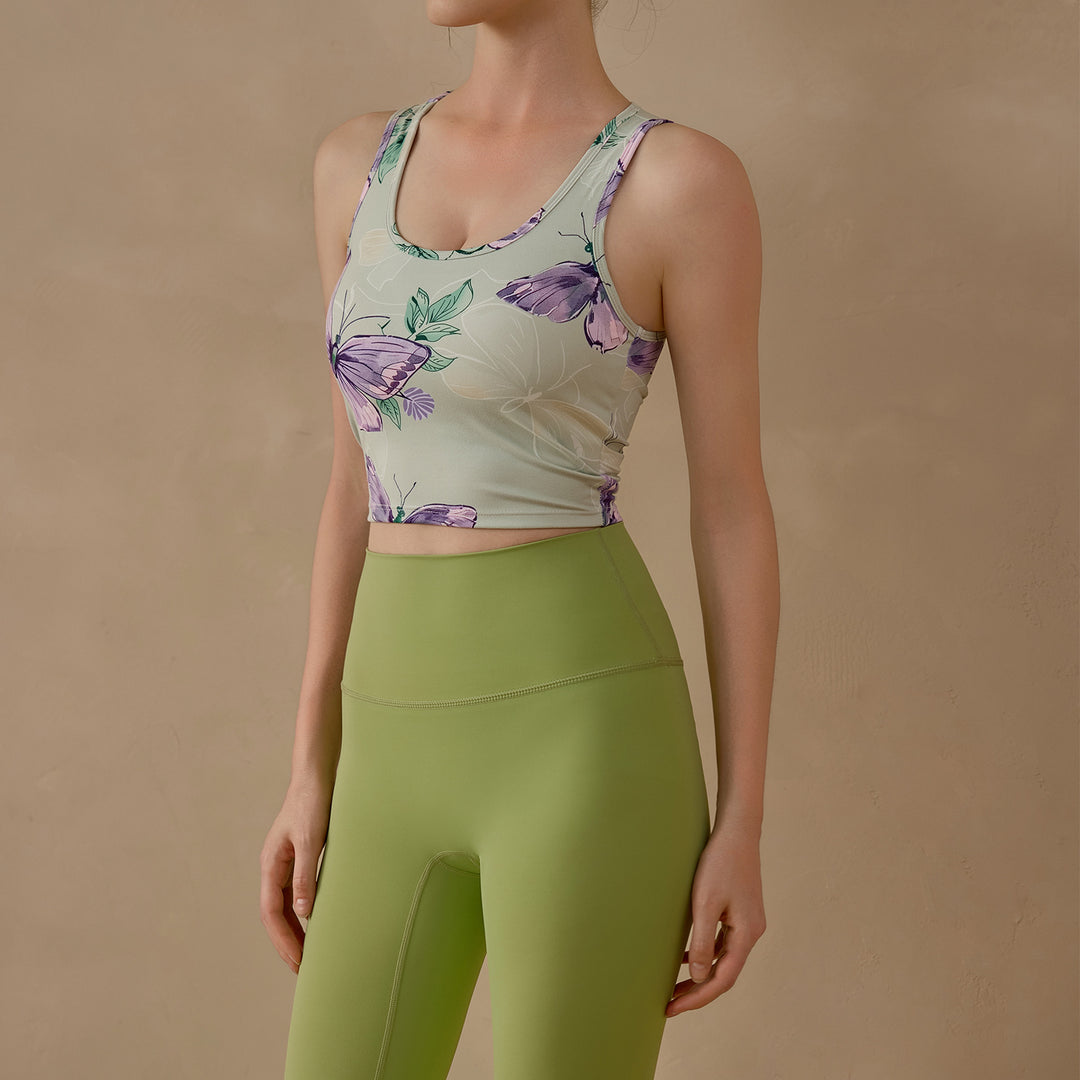 Dame Sporty Crop-Top med farverigt sommerfuglemønster og ergonomisk pasform Stilla