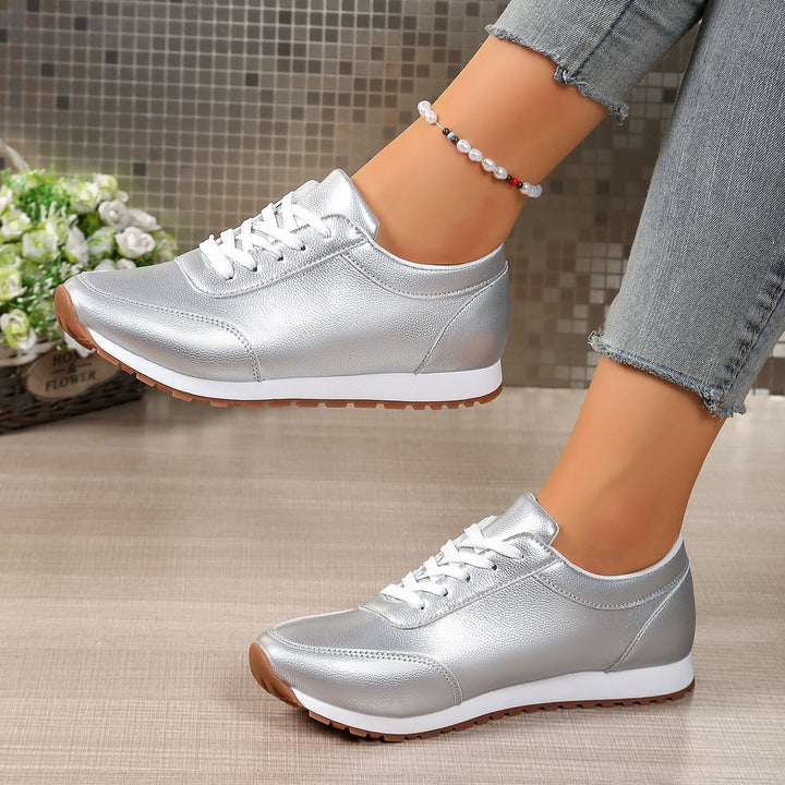 Dame Mode Sneakers i sporty design med glitrende overflade Stilla