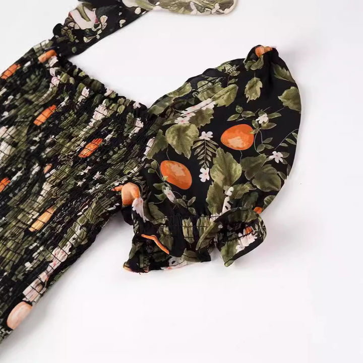 Dame midi-kjole med delikat blomsterprint og elastisk taljebånd Stilla