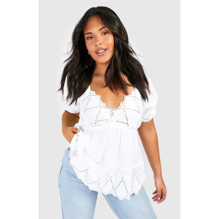 Damebluse med broderidetaljer og voluminøse ærmer Stilla