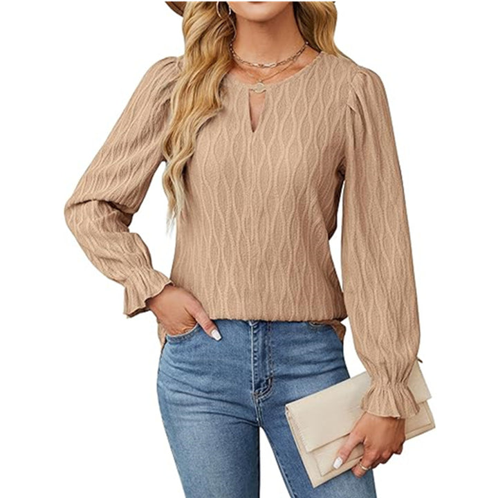 Dame indpakningsbluse med raffineret strukturdesign og elegante puffærmer Stilla