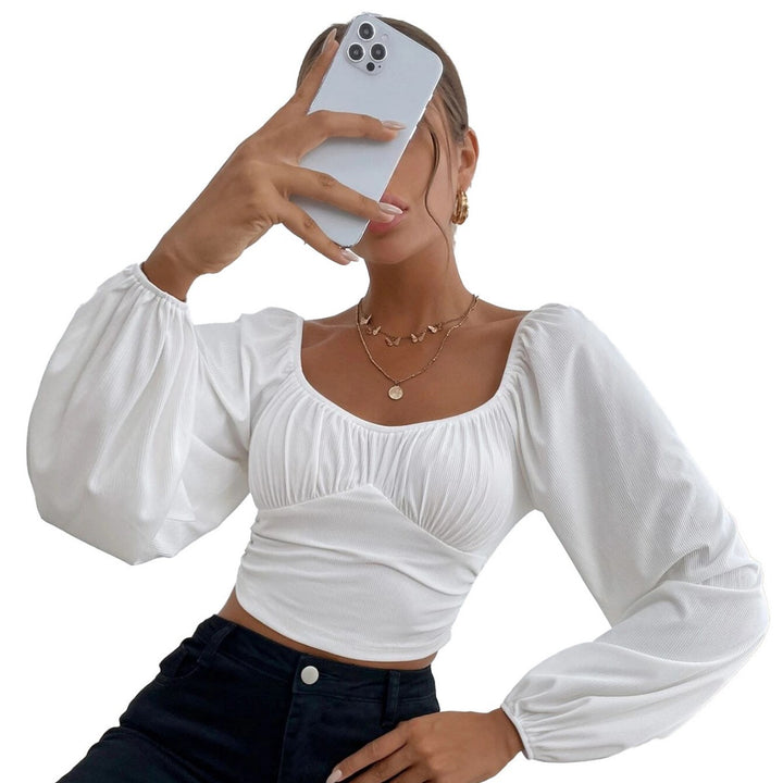 Kvindernes cropped top med stilfuld puffærmedesign og figursyet pasform Stilla