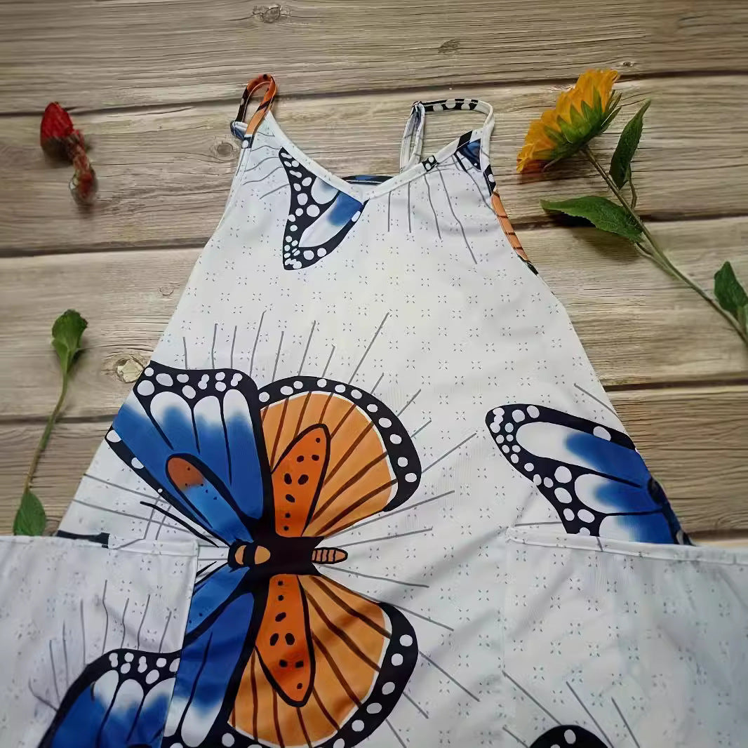 Dame jumpsuit med farverigt sommerfuglemønster og praktiske lommer Stilla
